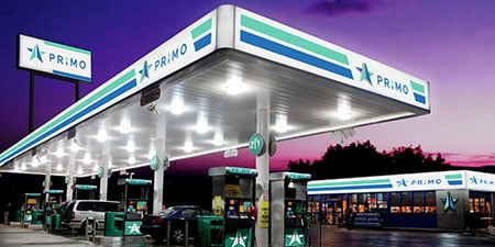 Petrol station with 3M Signage Films - shown at night time.
