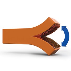 The most common way to measure adhesive bond strength is to pull the bond apart. Image of an adhesive bonding being pulled apart.
