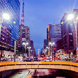 Image showing big city at night time with lots of bright lights and signs.