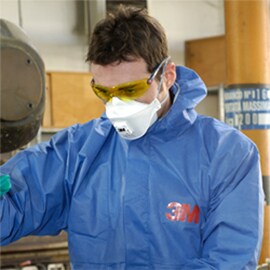 Worker in Protective Coveralls