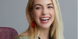 Woman smiling in chair
